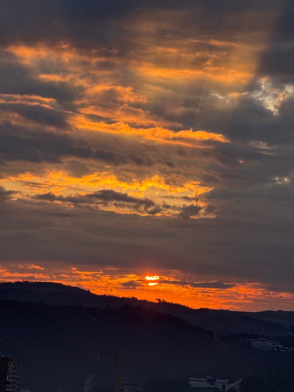 Sunrise captured over Veliko Tarnovo Bulgaria mountain horizon