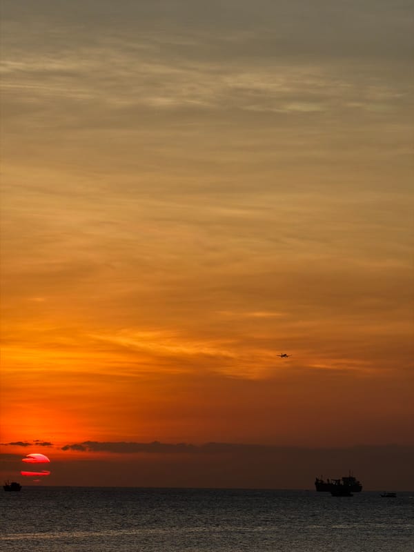 Sunset dining and strolls captured at Kuta beaches