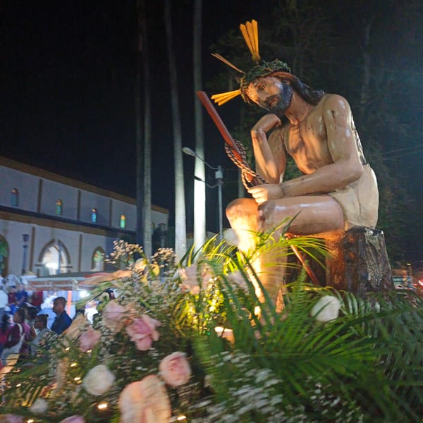 Nighttime religious procession features Jesus statue in Tinaquillo, Venezuela