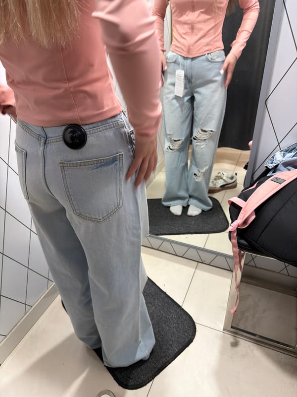 Young women shopping and taking selfies in Berezniki mall