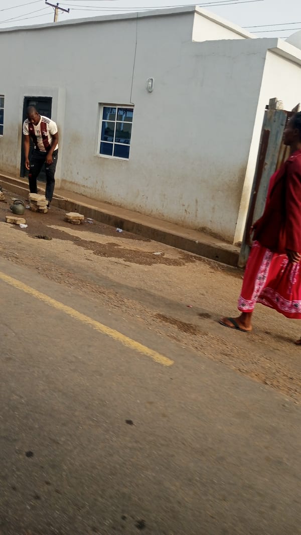 Morning street life captured in Adankolo, Nigeria