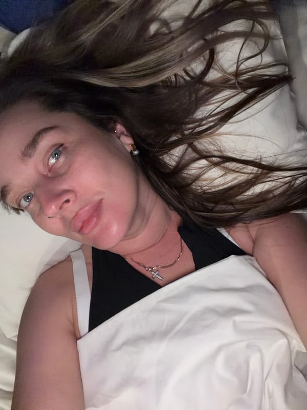 Person photographed in bed in Moscow