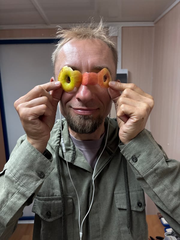 Couple plays with apple rings as glasses in Ukraine
