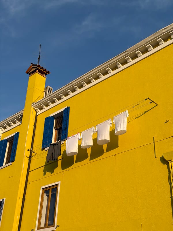 Witness documents Burano's colorful canal-side architecture in Venice