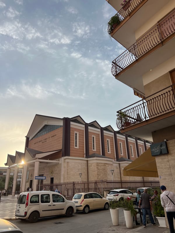 Witness documents Bitonto streetscapes and basilica during evening hours