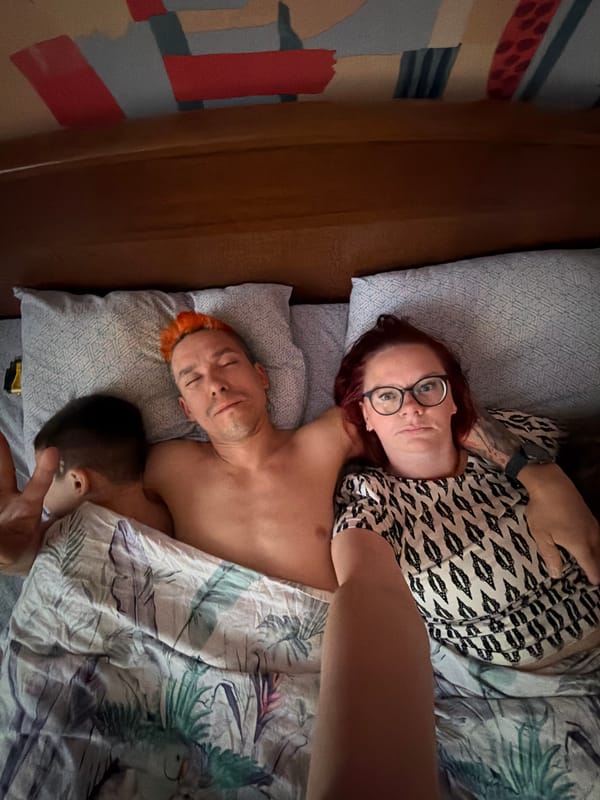 Family shares quiet bedroom moment in Chaikovsky, Russia