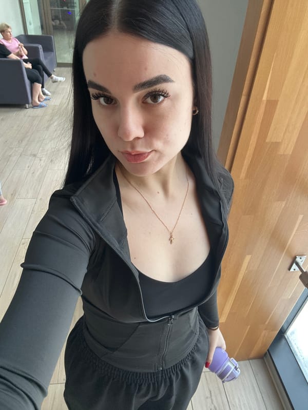 Woman documents workout routine at Saint Petersburg fitness center
