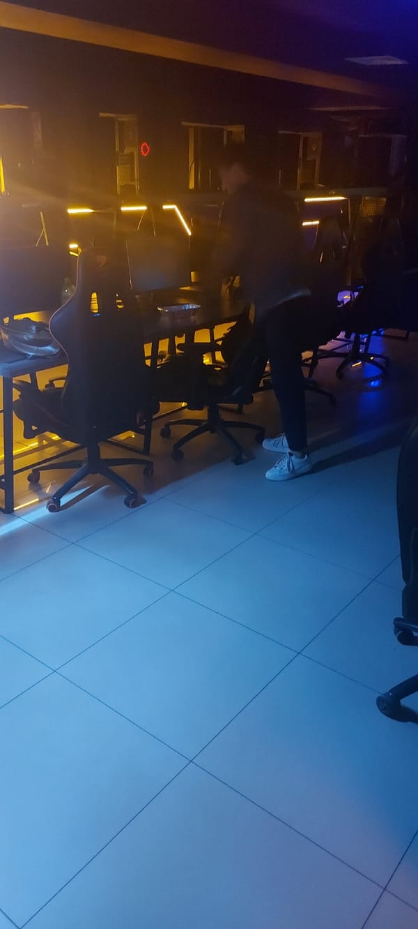 People gather at internet cafe in Tashkent