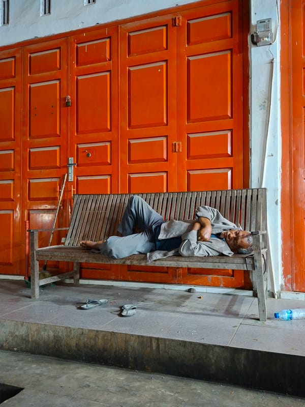 Evening scenes documented in Keudegeudong, Indonesia include food stalls, BNPB vehicles