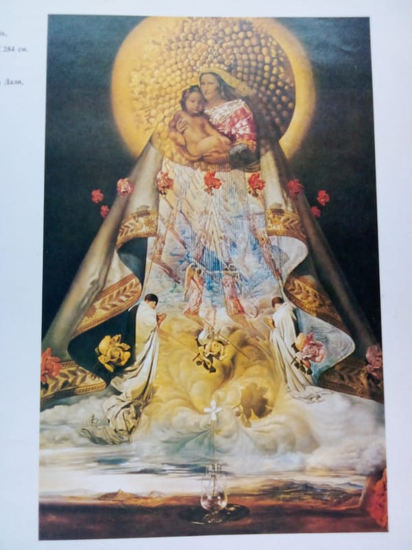 Paging through an illustrated art history book in Ukraine