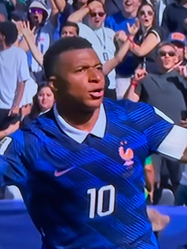 Soccer match footage with France scoreline graphics, June 2026