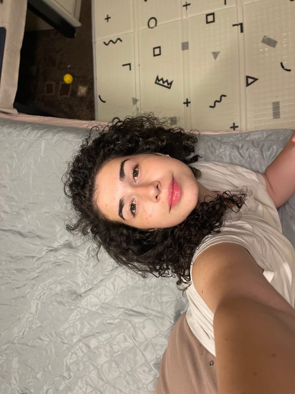 Woman and poodle share quiet evening at Sofia home