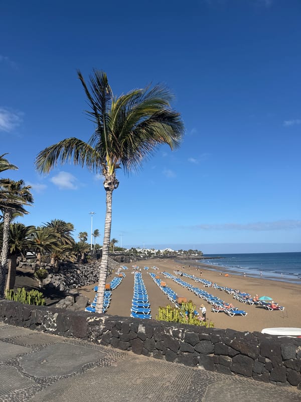 Tourist captures sunny Puerto Del Carmen beach and street scenes