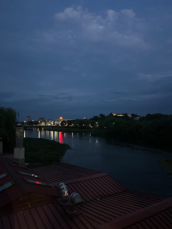 Evening scenes captured across Plovdiv include skyline views, novelty candles