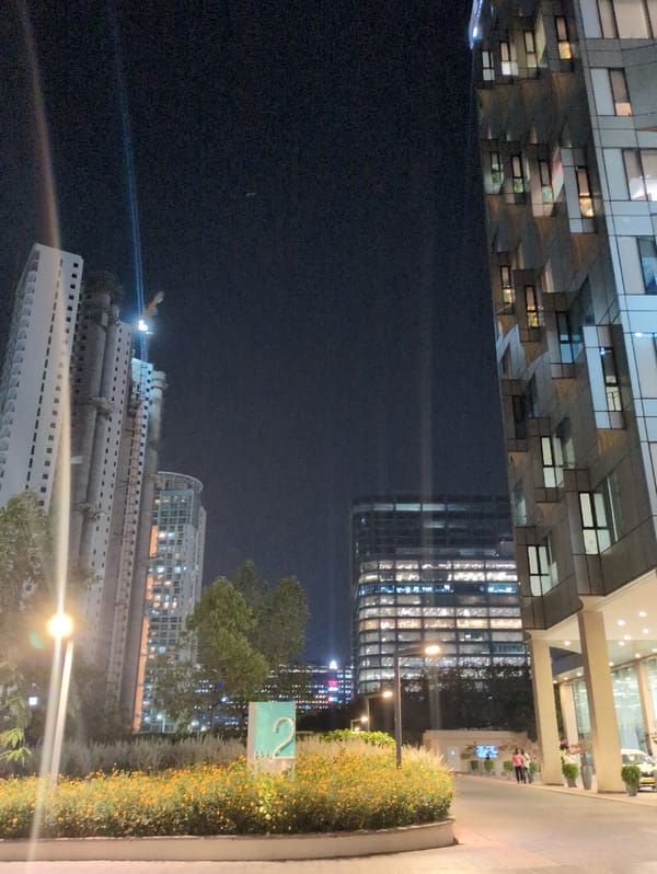 Witness documents illuminated Bengaluru buildings at night