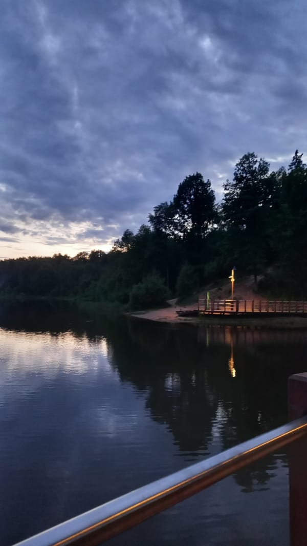 Evening lakefront recreation area documented in Krasnogorsk, Russia
