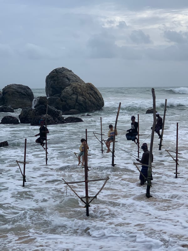 Stilt fishing, beach scenes, and old buses on Sri Lanka's southern coast