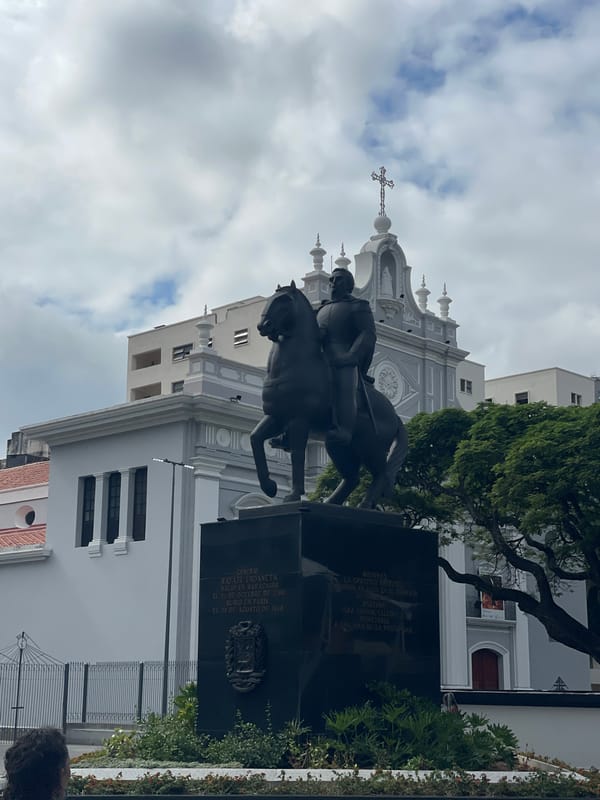 Tourist documents historic monuments and architecture in central Caracas