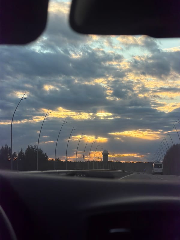 Highway journey captured during golden hour in Krasnoyarsk