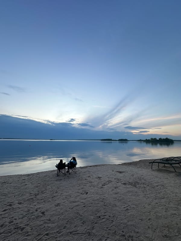 Peaceful lakeside scene captured in rural Belarus countryside
