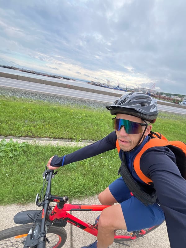 Cycling a waterfront path near the port in Chaikovsky