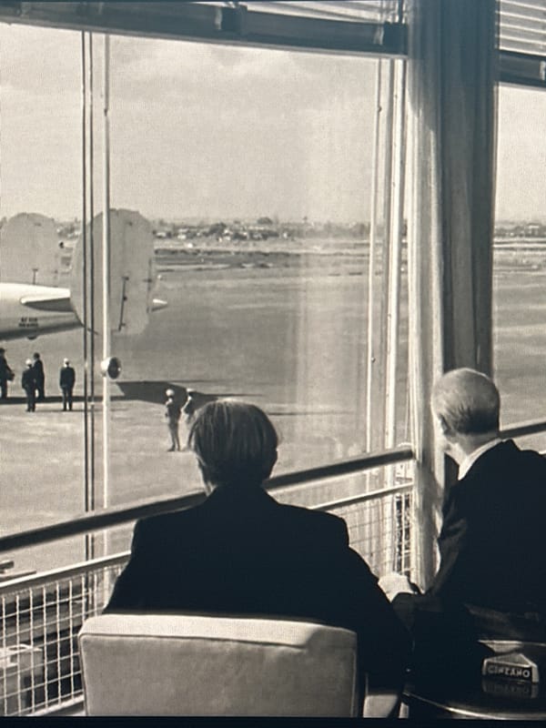 Two suited men spotted at North Kuta airport