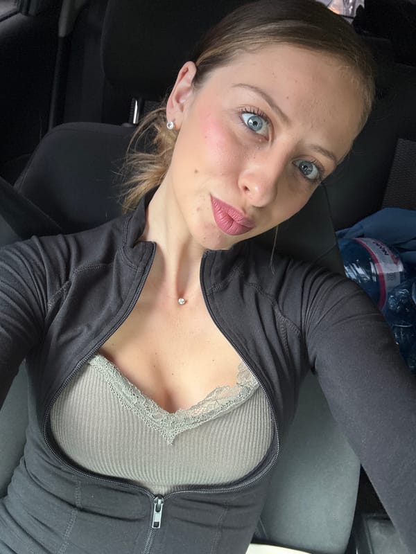 Woman takes selfie in car in Sofia, Bulgaria