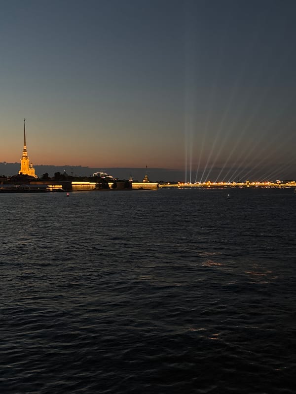 Saint Petersburg's waterfront landmarks glow during a late-night light show
