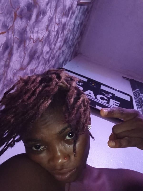Person documents indoor photo session in Shagamu, Nigeria