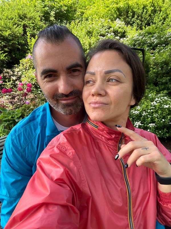 Couple enjoys morning playground visit with dog in Oslo
