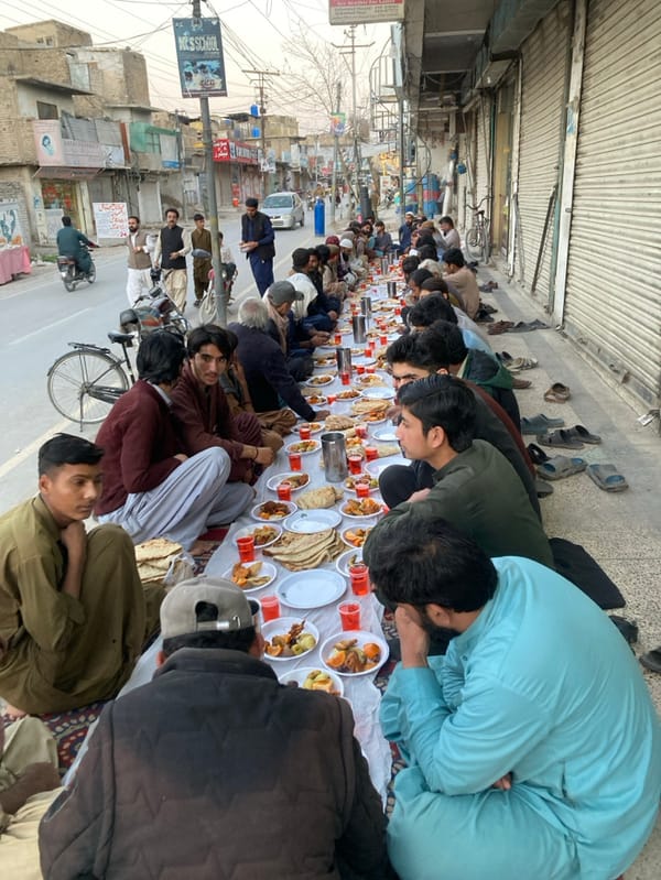 Community street meal brings dozens together in Quetta, Pakistan
