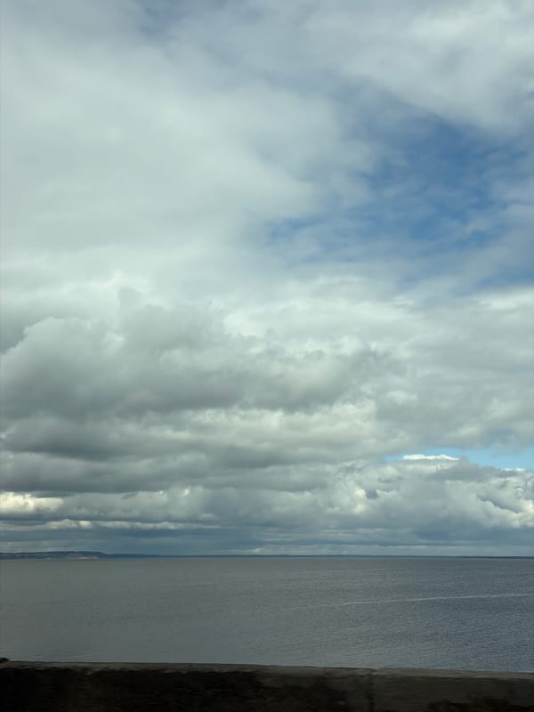 Morning calm at Chaikovsky waterfront under cloudy skies