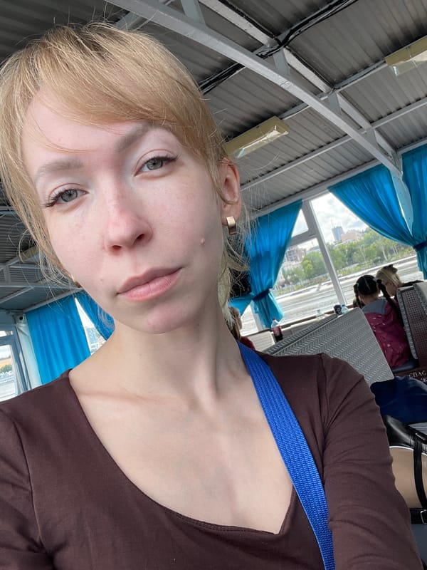 River boat passengers document morning cruise on Kama River