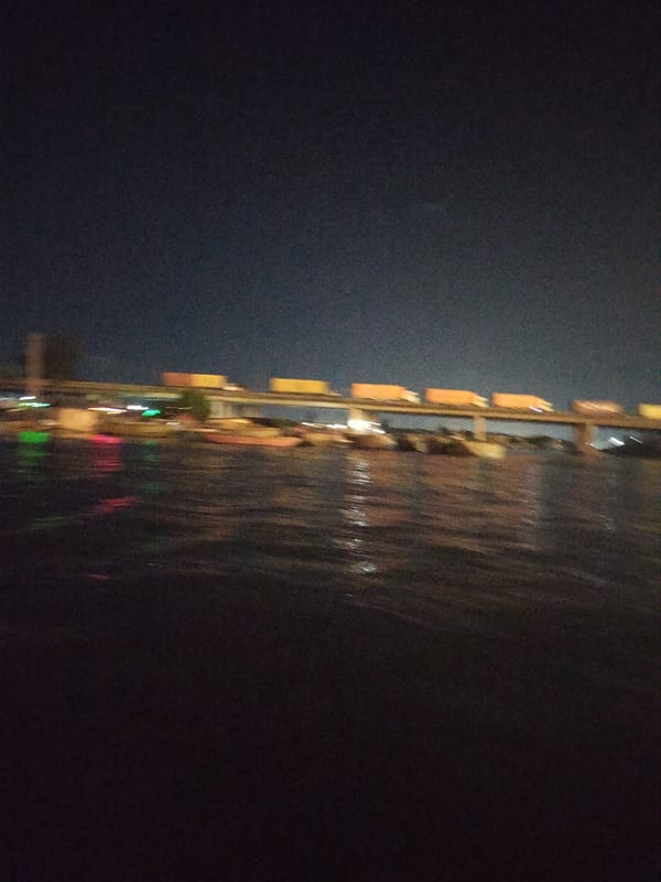 Evening traffic and boat activity recorded at Alaiyabiagba bridge
