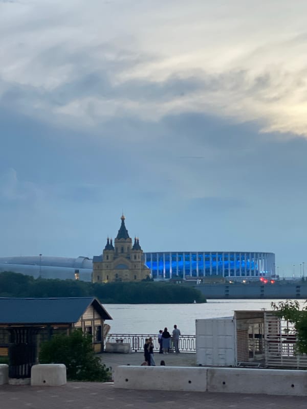 Evening at Nizhny Novgorod's illuminated waterfront fountains and embankment