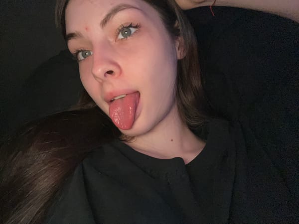 Woman documents selfies and artwork in Saint Petersburg bathroom