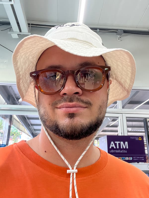 Man in orange shirt observed inside commercial building
