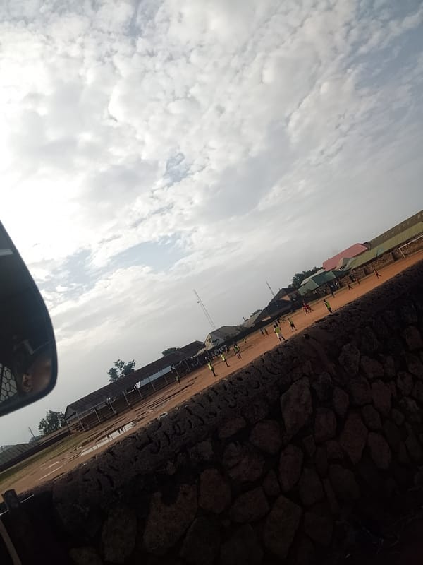 Soccer match plays out on muddy field in Bukuru