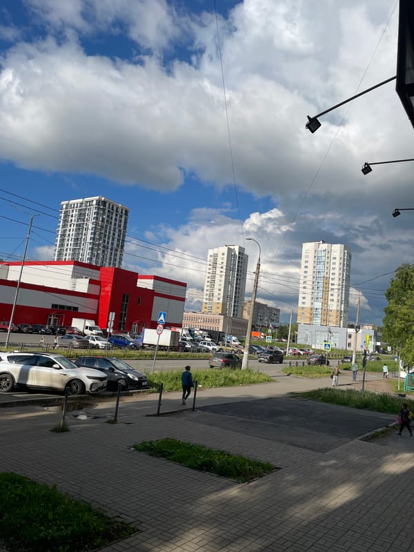 Motorcycle rider, pedestrian document ordinary Izhevsk street scenes