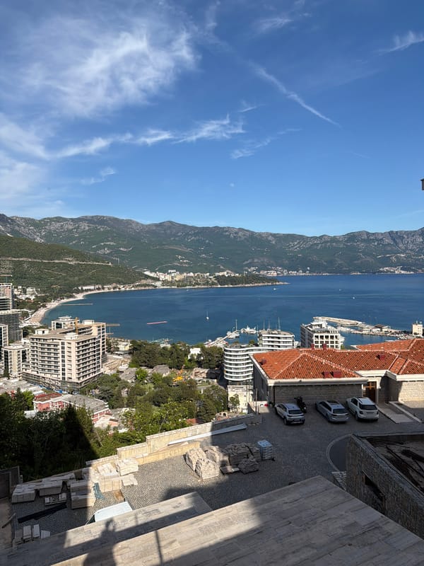 Tourist documents afternoon visit to Budva coastline with selfies