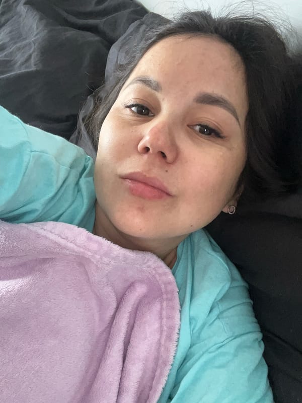 Woman rests in bed in Podolsk, Russia