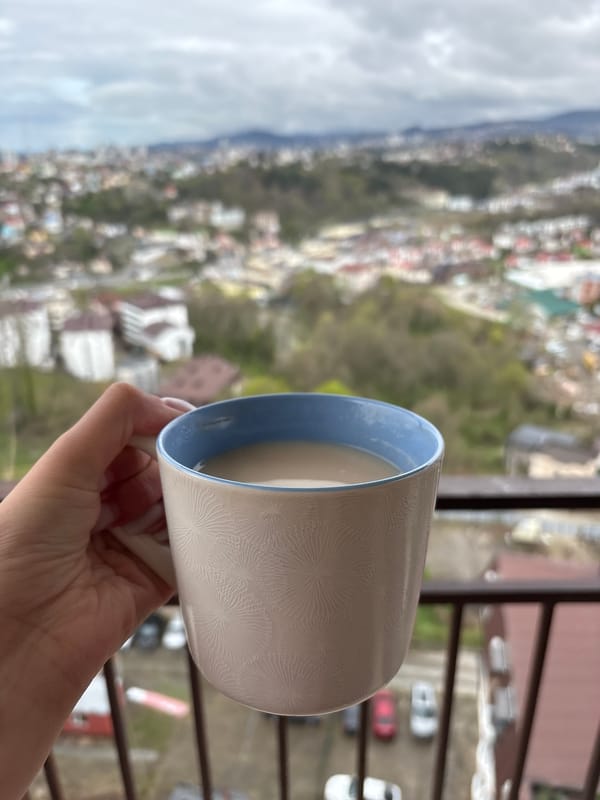 Morning beverage moment captured in Sochi, Russia