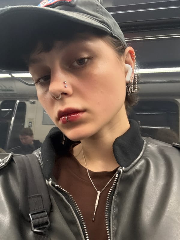 Commuter rides Saint Petersburg subway during midday
