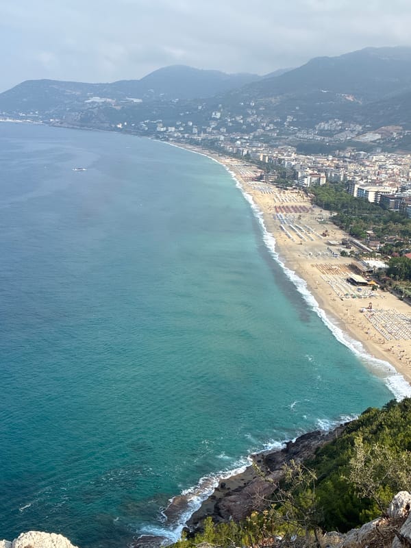 Alanya morning: coastal views, a napping cat, and outdoor yoga