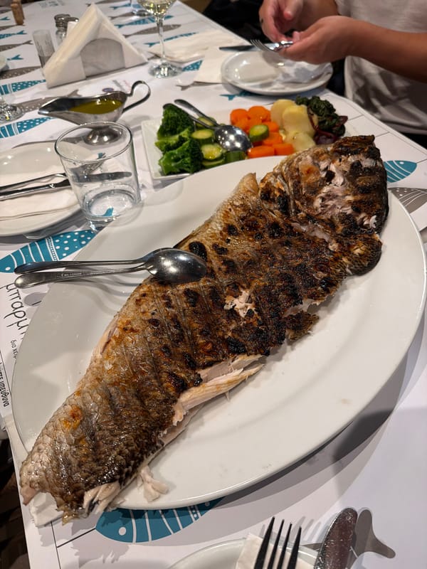 Grilled fish served at restaurant in Glifada, Greece