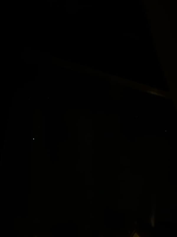 Dark conditions with faint lights observed in Reigate area