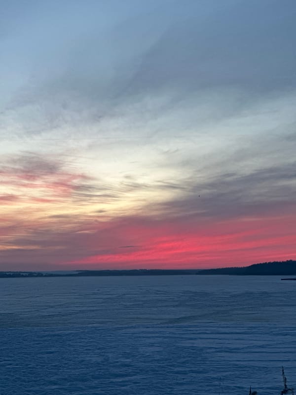 Winter twilight scenes documented at frozen Votkinsk Reservoir, Russia