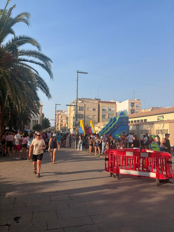 Foam party and inflatable slide at Sagunto summer street festival