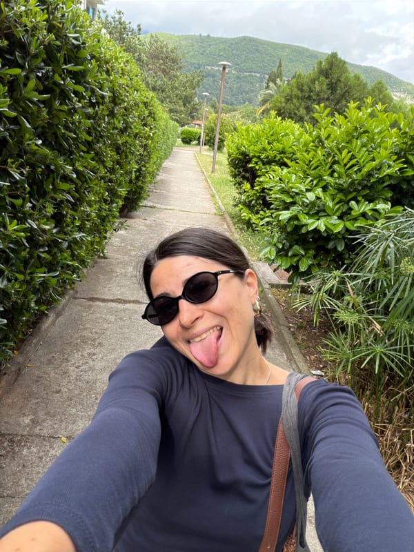 Woman takes selfie on path in Budva, Montenegro