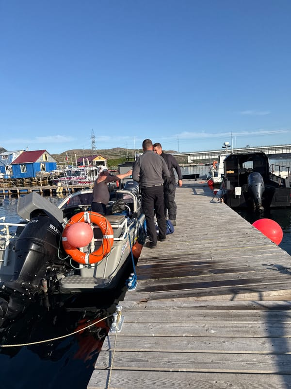 Sunny afternoon at Teriberka's harbor dock